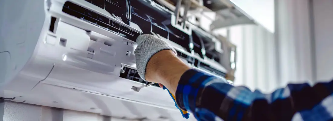 MiniSplit-Install-1100×400 Technician working on a mini-split